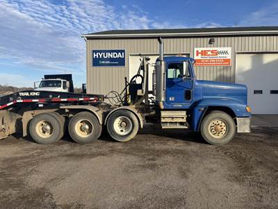 Freightliner FLD120 Classic Tri Axle Day Cab Truck - Caterpillar 550HP, 13 Speed Manual