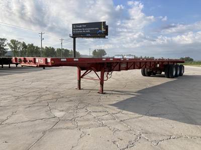 Fontaine 48x102 Tri Axle Steel Flatbed Trailer - Spring, Sliding Axle