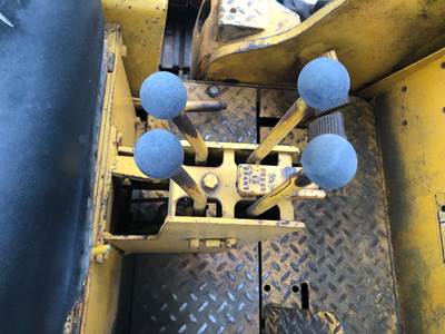 (Used) Case 1150 Type: Manual (Uses Linkages) Part #: - 4 Center Mounted Track Control Sticks And Linkages With Bracket