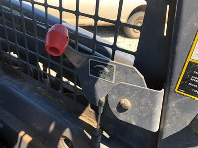 (Used) New Holland LS140 Type: Manual (Uses Linkages) Part #: - Ref# 86525826 Throttle Lever With Mount Bracket Only