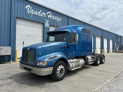 International 9400 Sleeper Semi Truck - 60" Mid Roof Sleeper, Cummins 500HP, 10 Speed Manual