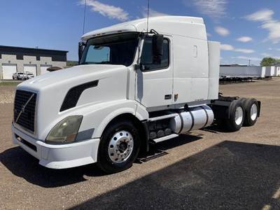 Volvo VNL64T630 Sleeper Semi Truck - Mid Roof Sleeper, Cummins 450HP, 10 Speed Manual
