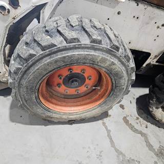 Bobcat S185 Tire & Rim for a Bobcat S150