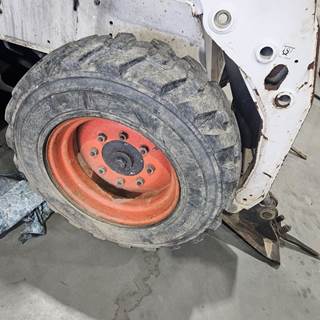 Bobcat S185 Tire & Rim for a Bobcat S150
