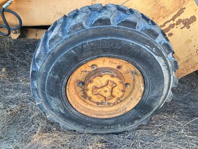 Case 580E Tire & Rim