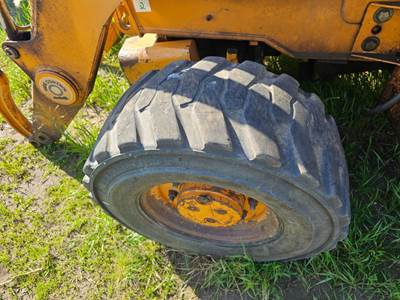 Case 580M Tire & Rim