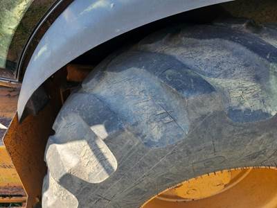 Case 580M Tire & Rim