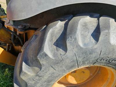 Case 580M Tire & Rim