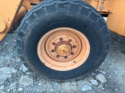 Case 580M Tire & Rim