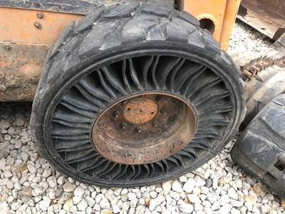 Case 60XT Tire & Rim