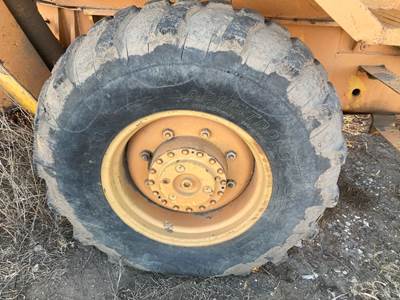 Case 680E Tire & Rim