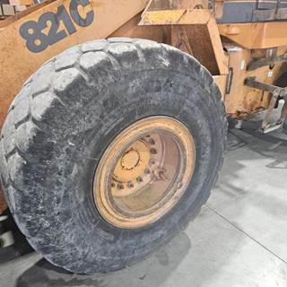 Case 821C Tire & Rim