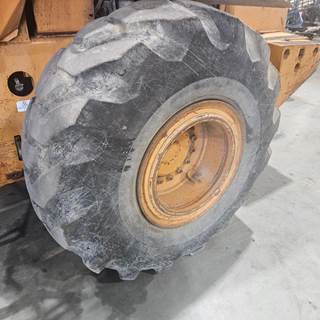 Case 821C Tire & Rim