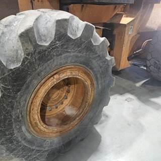 Case 821C Tire & Rim