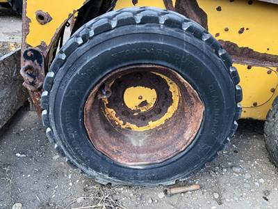 Caterpillar 226B Tire & Rim