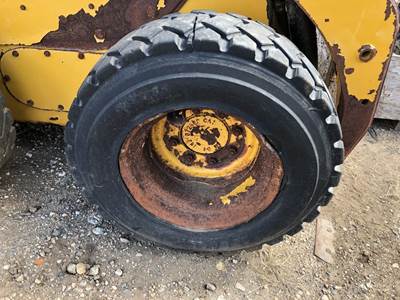 Caterpillar 226B Tire & Rim
