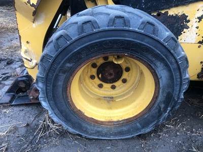 Caterpillar 226D Tire & Rim