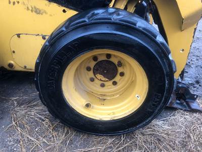 Caterpillar 226D Tire & Rim