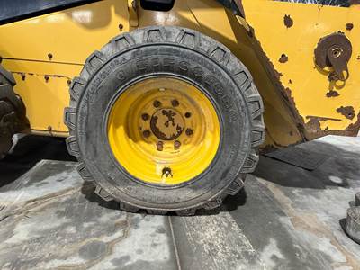Caterpillar 242D Tire & Rim