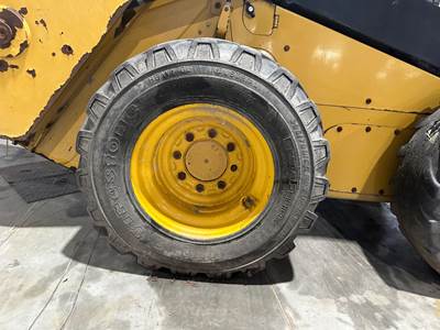 Caterpillar 242D Tire & Rim