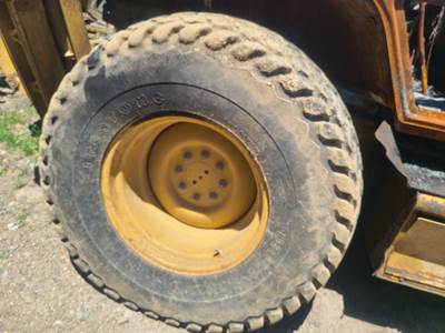Caterpillar 416D Tire & Rim