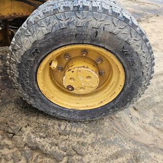 Caterpillar 420D Tire & Rim