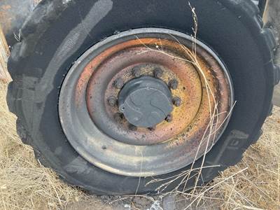 Caterpillar TL642 Tire & Rim