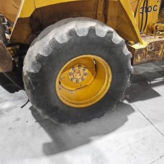 John Deere 310C Tire & Rim