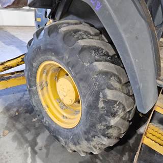 John Deere 310K Tire & Rim