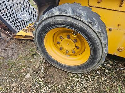 John Deere 318G Tire & Rim