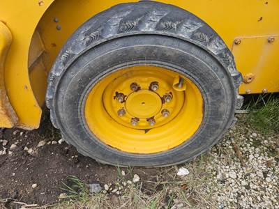 John Deere 318G Tire & Rim