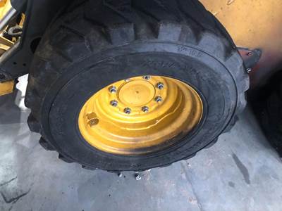 John Deere 324E Tire & Rim