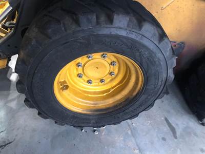 John Deere 324E Tire & Rim