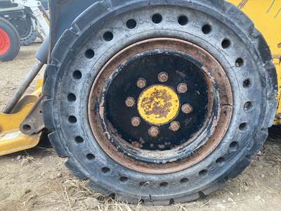 John Deere 324E Tire & Rim