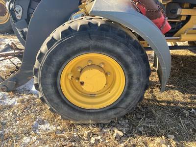John Deere 324J Tire & Rim