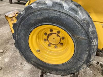 John Deere 325 Tire & Rim
