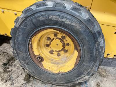 John Deere 325 Tire & Rim