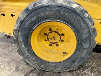John Deere 325 Tire & Rim