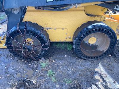 John Deere 326D Tire & Rim