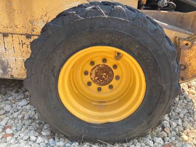 John Deere 332D Tire & Rim
