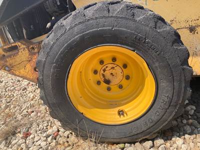 John Deere 332D Tire & Rim