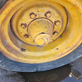 John Deere 410B Tire & Rim