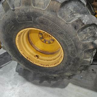 John Deere 510D Tire & Rim