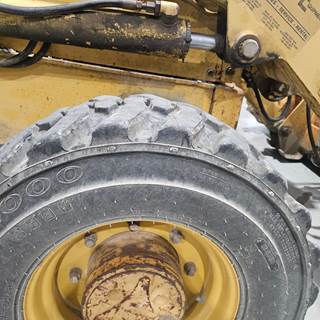 John Deere 510D Tire & Rim