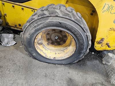 Komatsu SK820 Tire & Rim