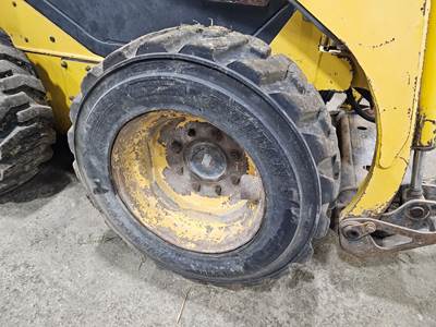 Komatsu SK820 Tire & Rim