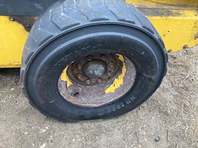 New Holland L185 Tire & Rim