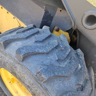 New Holland L185 Tire & Rim