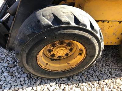 New Holland LS180 Tire & Rim