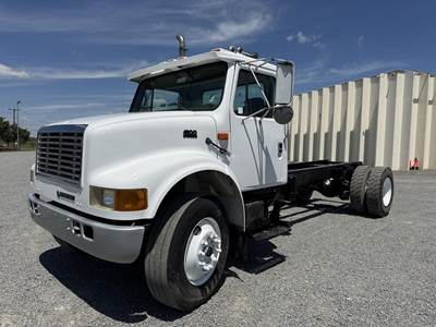 International 4900 Side Load Garbage Truck - DT466, Automatic